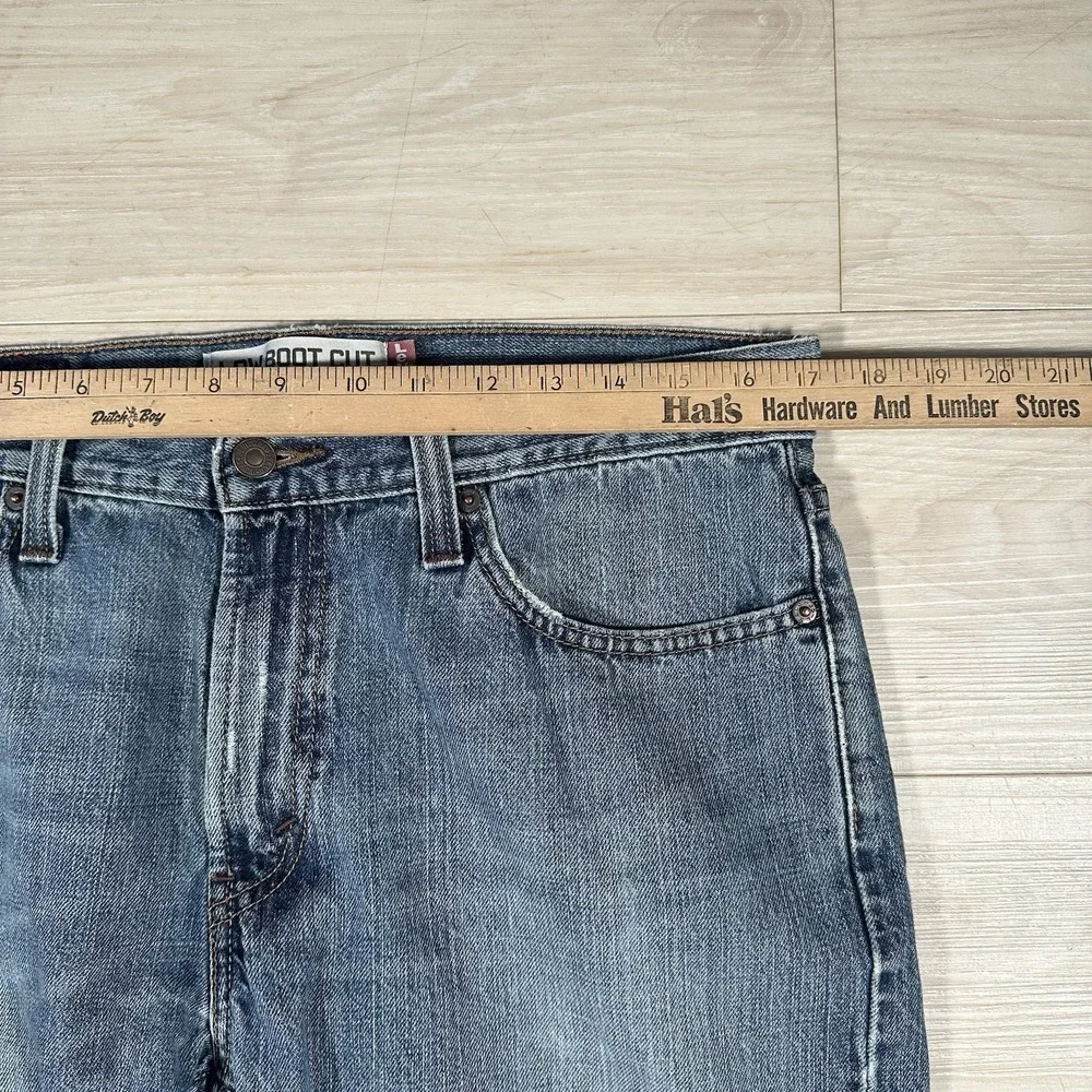 Levi's 527 Slim Bootcut Jeans Mens 34x30 Medium Blue Wash 100% Cotton Distressed